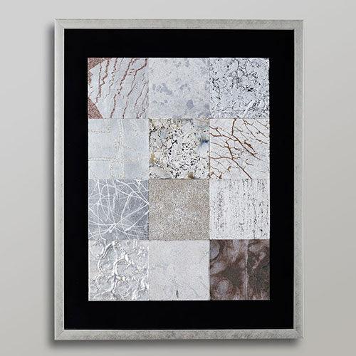 A silver leaf wall art composed of nine panels, each depicting a natural element like wind or rock.