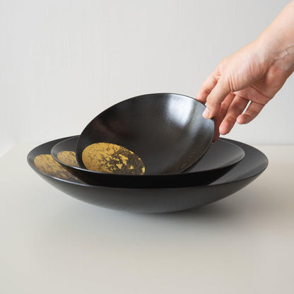 Hand Holding A Japanese Gold Leaf Lacquerware Bowl