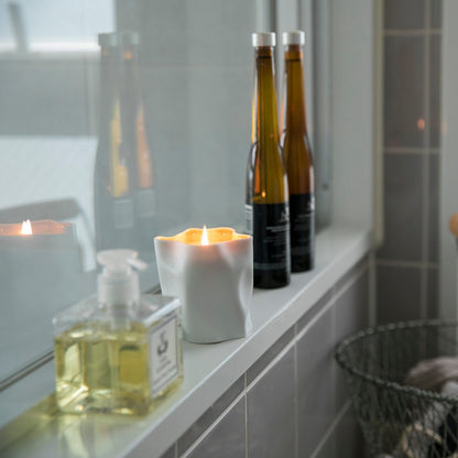Japanese candle in soft white porcelain, Japandi bathroom with wabi sabi inspired fragrance ritual