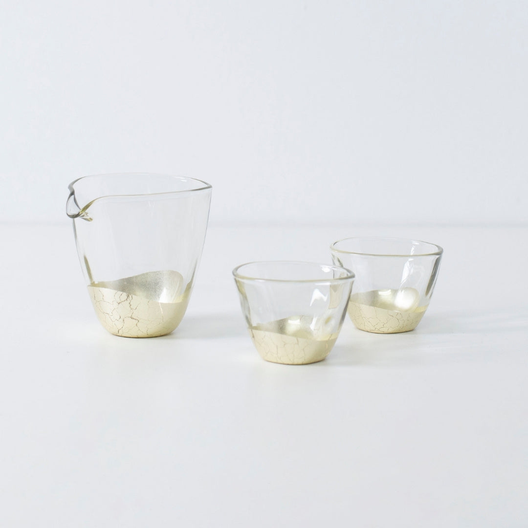 Refined Japanese sake set with champagne gold leaf finish, including sake bottle and two crackle cups