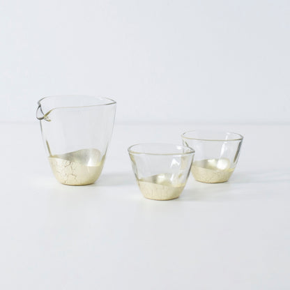 Refined Japanese sake set with champagne gold leaf finish, including sake bottle and two crackle cups