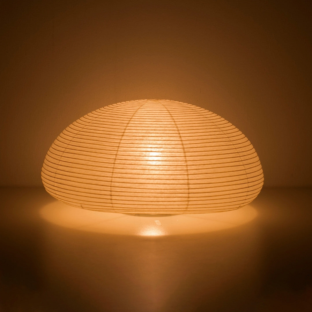 Japanese paper floor lamp "paper moon 04" glowing warmly – handcrafted Washi floor lamp