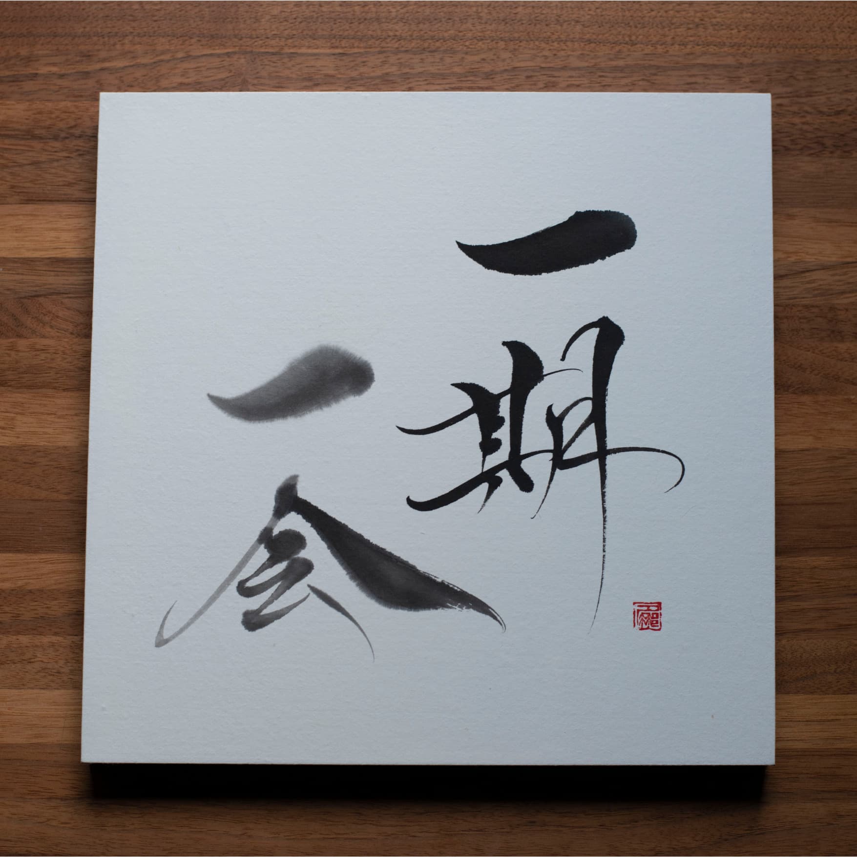 Top_View_of_Calligraphy_Panel_with_Ichigo_Ichie_on_Wooden_Table