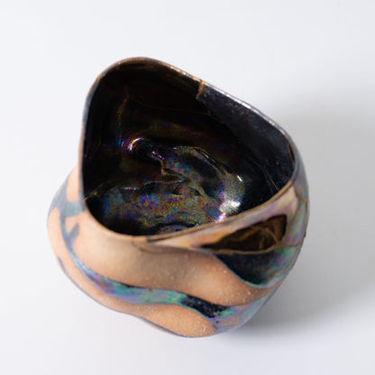 Top view of handcrafted Japanese kintsugi matcha bowl with shimmering gold seams