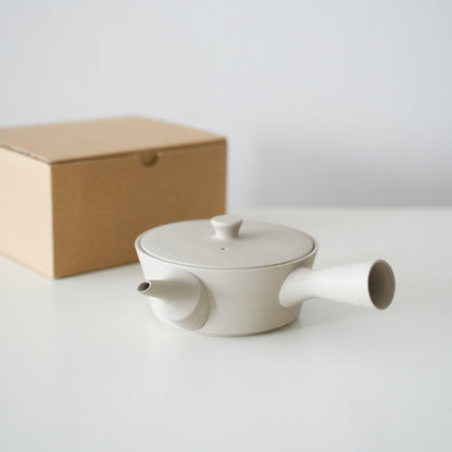 A simple and beautiful white Banko ware teapot in a paper box.