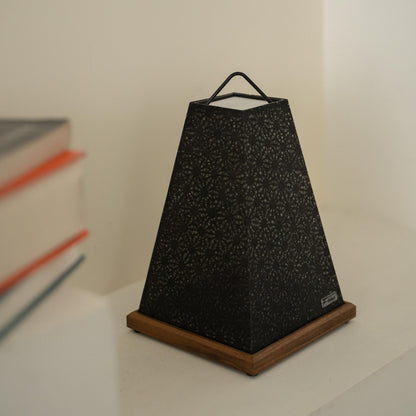 Close-up of unlit Japanese paper table lamp "Mini Akari" Black, showing intricate lace patterns for Japandi decor.