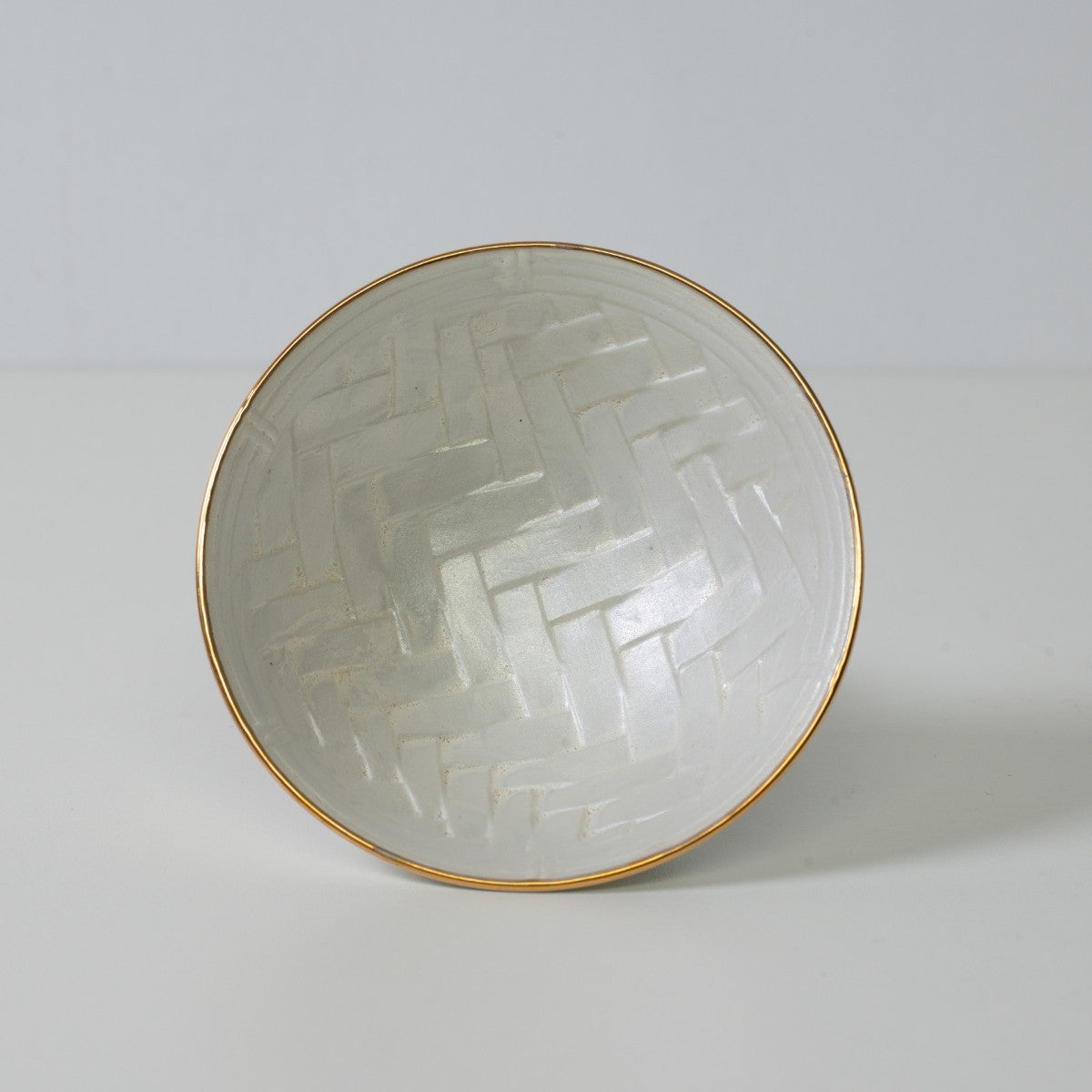 Basket weave sake cup, white porcelain - Detailed inner texture of Japanese sake cup with gold rim