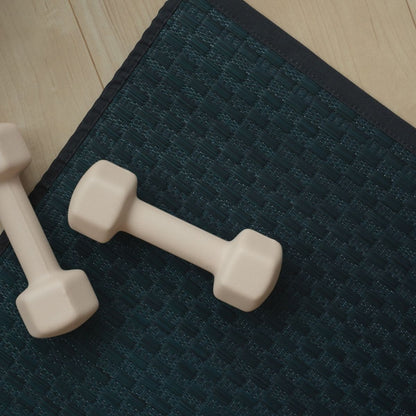 Detailed weave of the Japanese Tatami Yoga Mattress "Ed Plain" Navy with dumbbells, showing the clean minimalist grass texture.