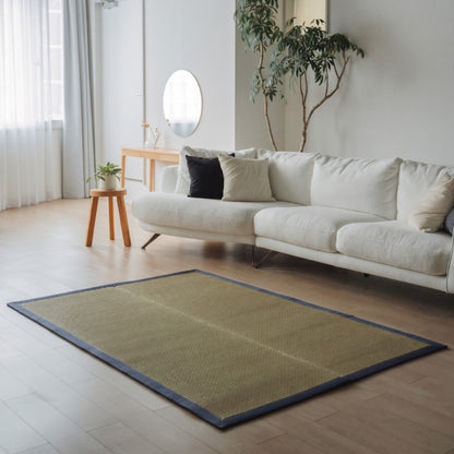 Rectangular Japanese Tatami Area Rug "MUKU" Denim on a light wooden floor for spacious mindful relaxation.