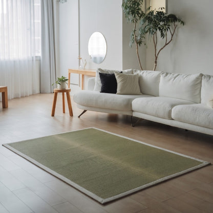 Rectangular Japanese Tatami Area Rug "MUKU" Natural on a light wooden floor for spacious mindful relaxation.