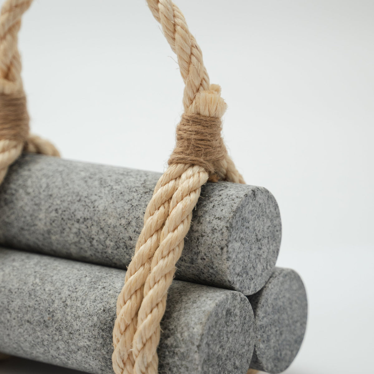 Detail view of Japanese Aji Stone Doorstop "komame" in gray.
