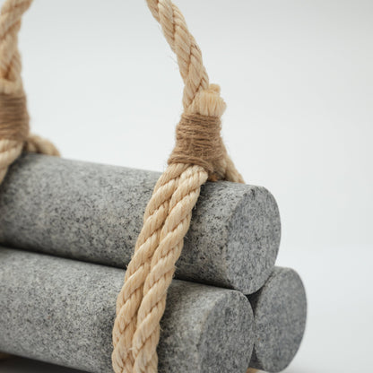 Detail view of Japanese Aji Stone Doorstop "komame" in gray.