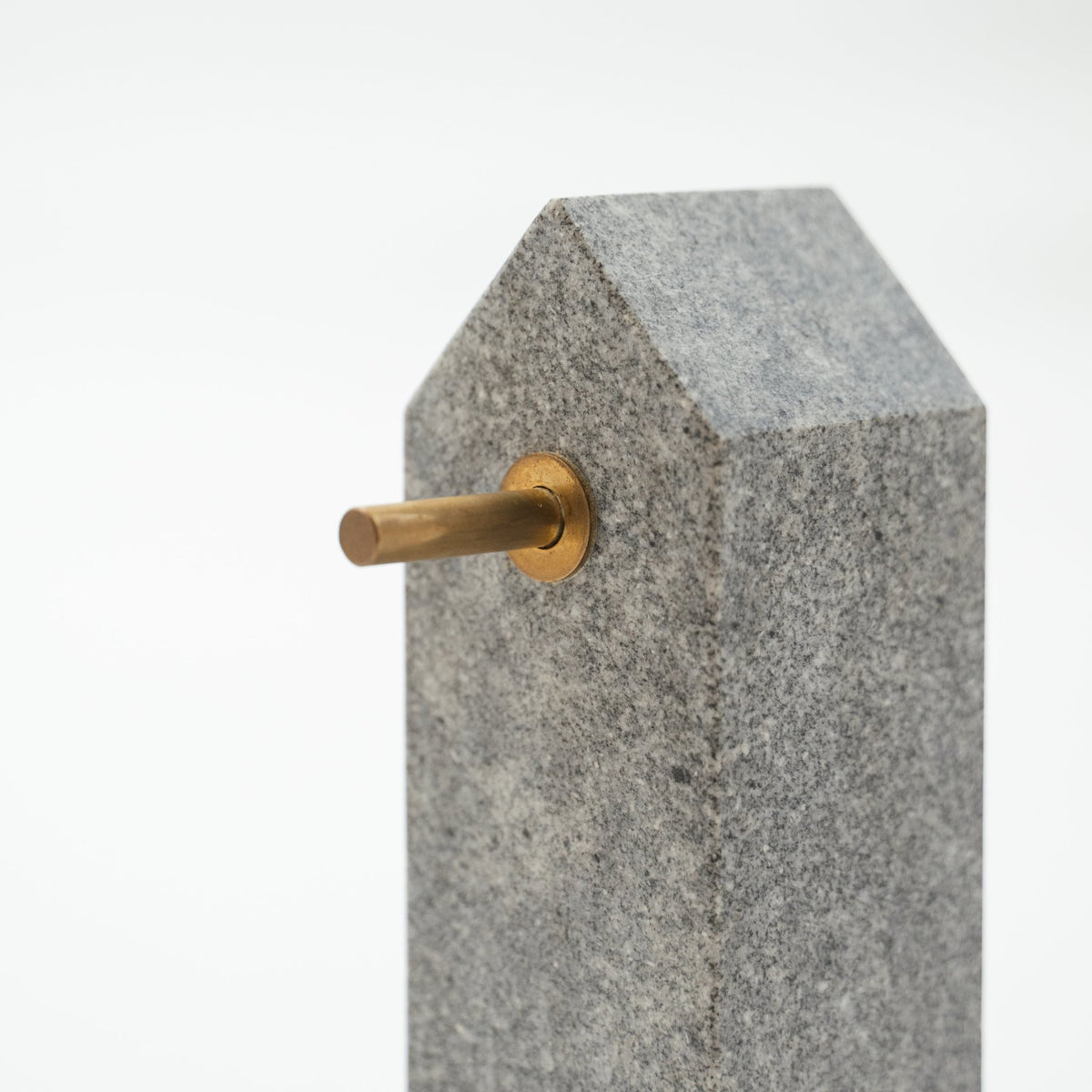 Detail view of Japanese Aji Stone Key Holder in natural stone.
