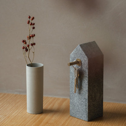 Japanese Aji Stone Key Holder in natural stone styled in a entryway setting, entryway scene view.