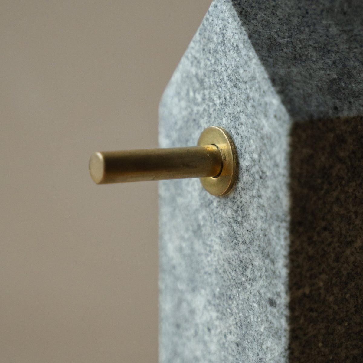 Japanese Aji Stone Key Holder in natural stone styled in a styled room, detail lifestyle view.