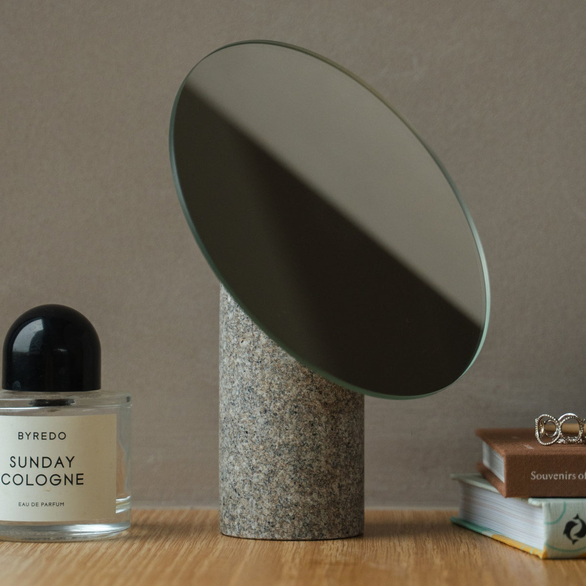 Japanese Aji Stone Table Mirror in natural stone styled in a interior space, interior scene view.