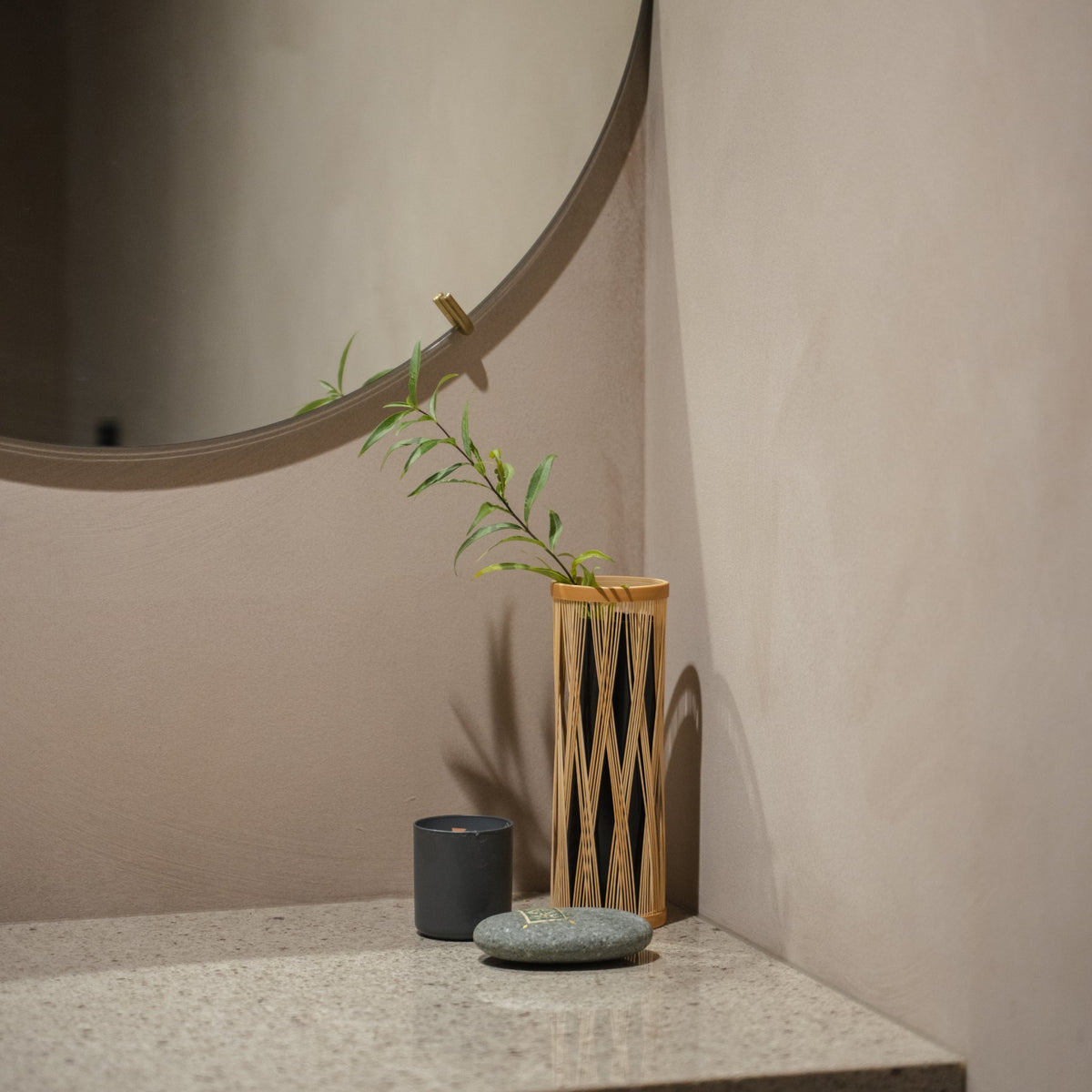 Japanese Bamboo Flower Vase "Entwined Branch" in brown styled in a interior space, interior scene view.