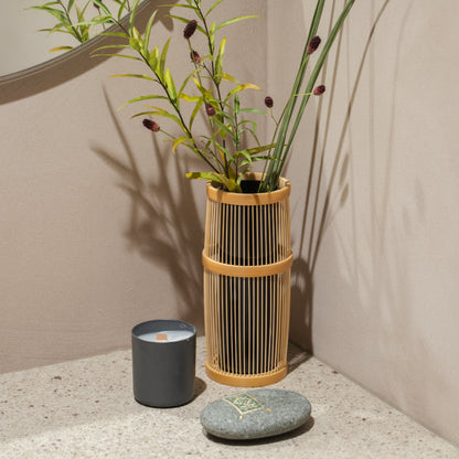 Japanese Bamboo Flower Vase "Shiori" in brown styled in a entryway setting, entryway scene view.