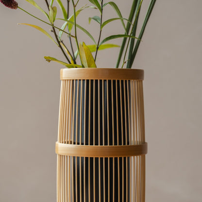 Japanese Bamboo Flower Vase "Shiori" in brown styled in a styled room, detail lifestyle view.