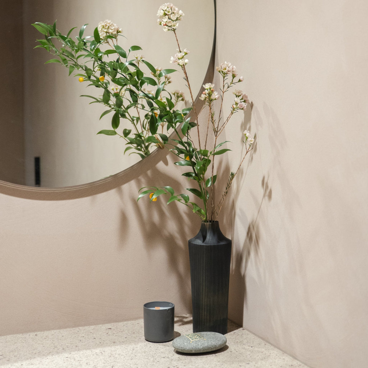 Japanese Cedar Ikebana Vase Indigo 02 in navy styled in a entryway setting, entryway scene view.