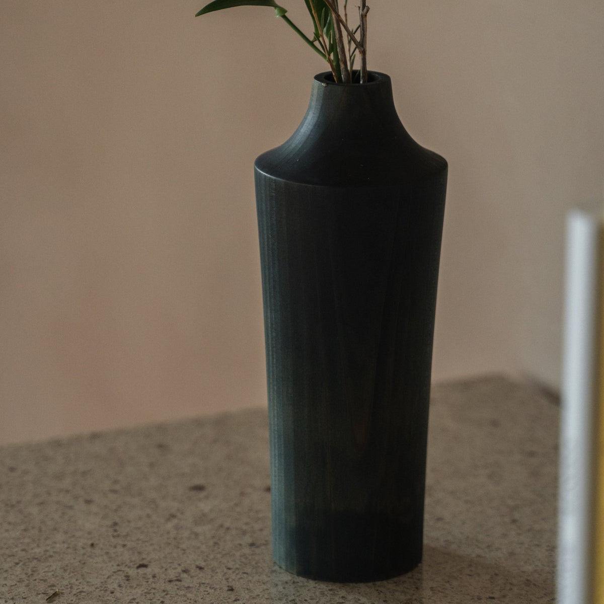Japanese Cedar Ikebana Vase Indigo 02 in navy styled in a styled room, detail lifestyle view.