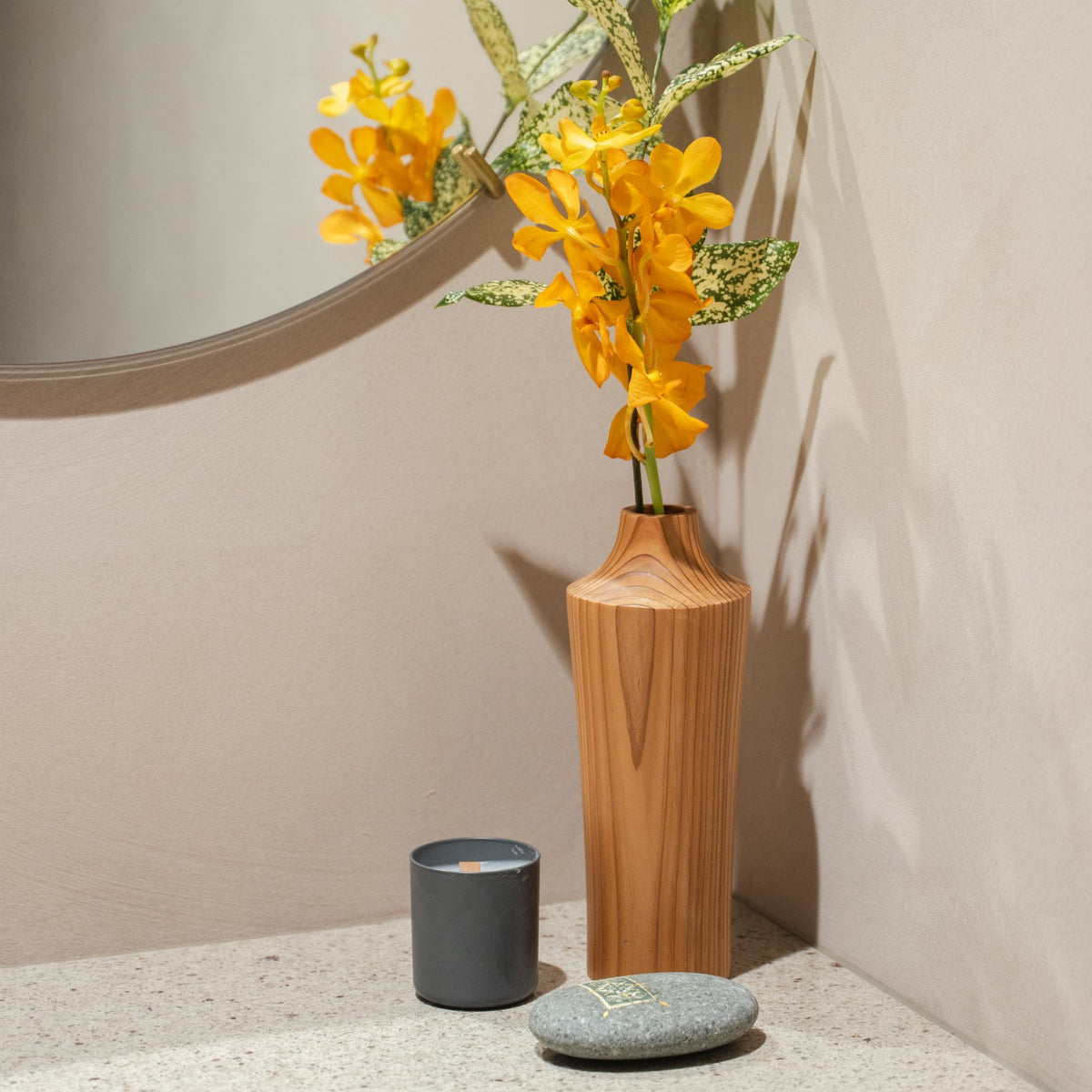 Japanese Cedar Ikebana Vase Natural Wood 02 in brown styled in a entryway setting, entryway scene view.