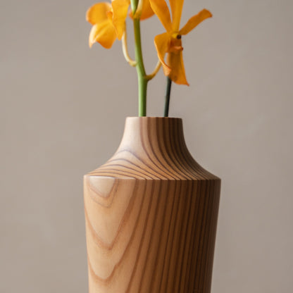 Japanese Cedar Ikebana Vase Natural Wood 02 in brown styled in a styled room, detail lifestyle view.
