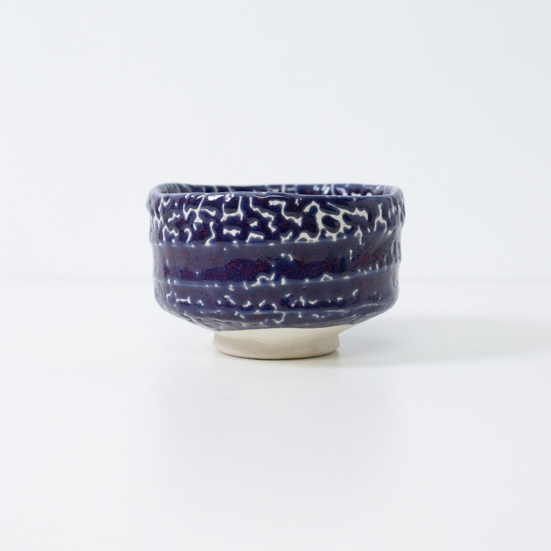"Midnight Blue Kairagi" Japanese matcha bowl featuring a traditional crawled glaze technique that creates a starry night sky texture.