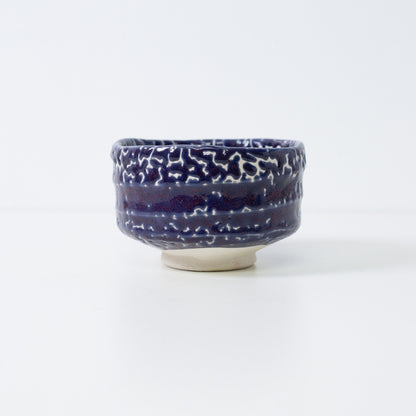 "Midnight Blue Kairagi" Japanese matcha bowl featuring a traditional crawled glaze technique that creates a starry night sky texture.