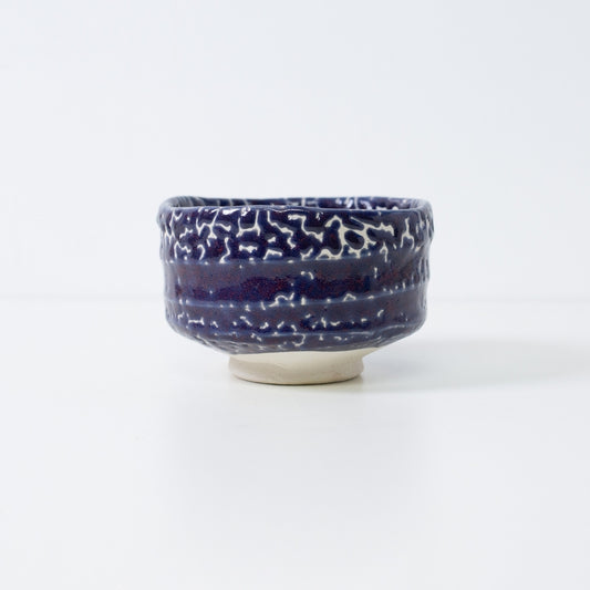 "Midnight Blue Kairagi" Japanese matcha bowl featuring a traditional crawled glaze technique that creates a starry night sky texture.