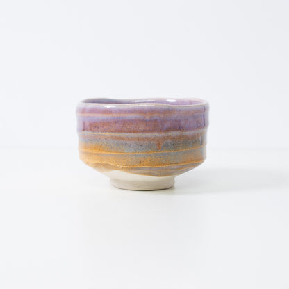 "Pale Violet Haze" Japanese matcha bowl featuring a glossy violet glaze that fades into warm clay tones, resembling morning mist.