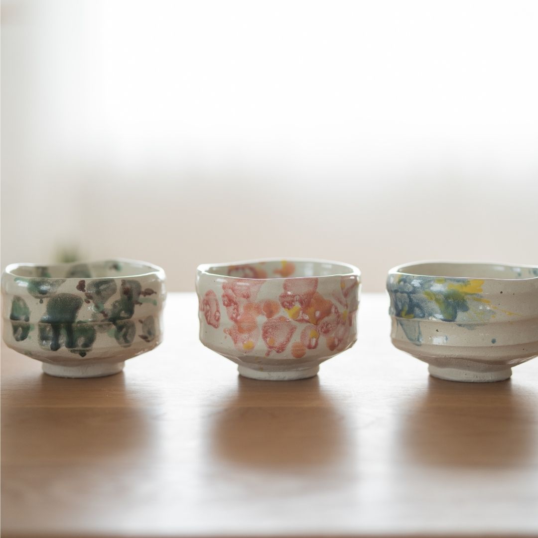 Trio of Shino ware matcha bowls: Forest, Flower, and Splash, displaying the unique seasonal artistic glaze expressions of the Shinzan Kiln.
