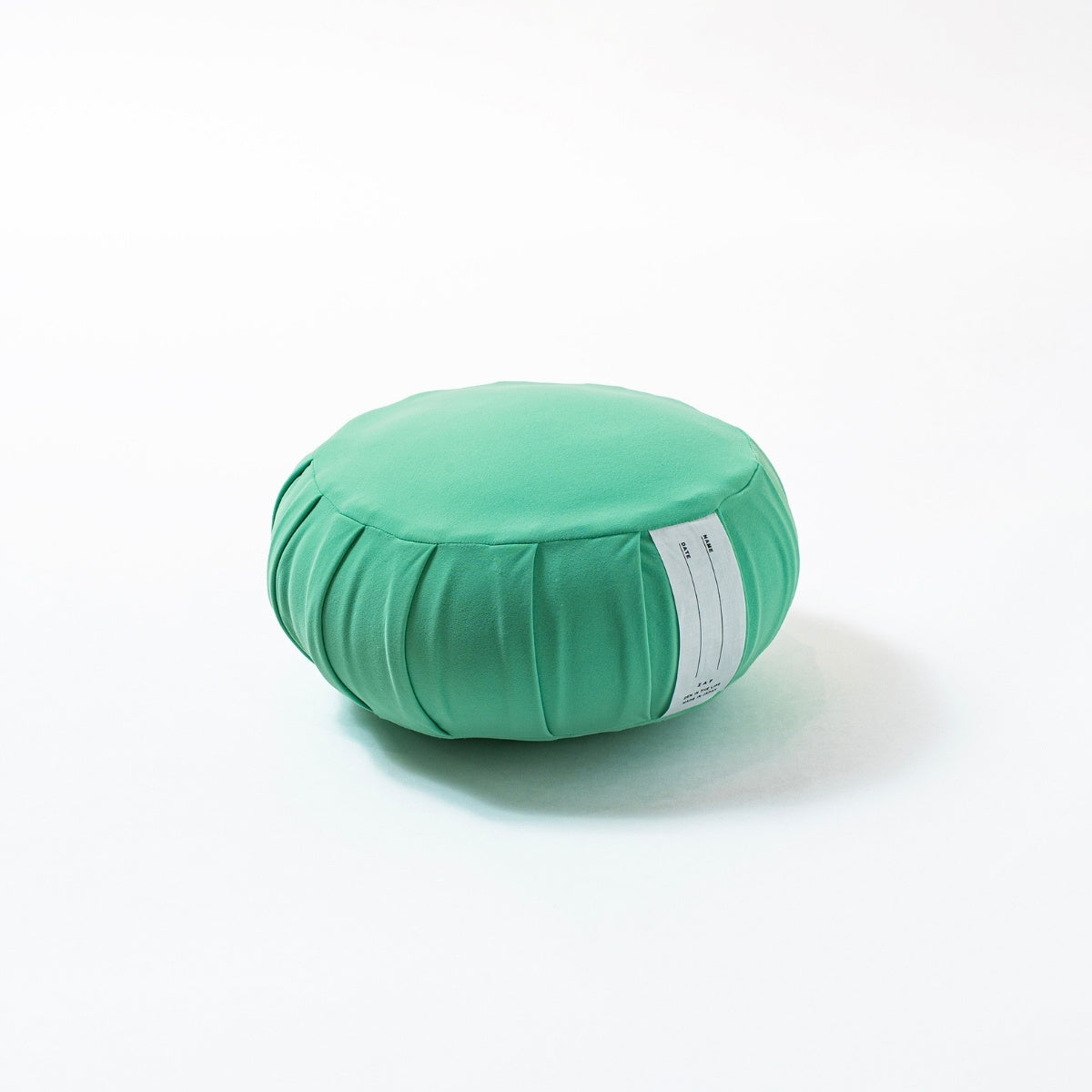 Japansk meditationspude zafu "ZAF MOMENT" medium, mintgrøn, kapok - Rundt plisseret design til zen- og yogameditation.