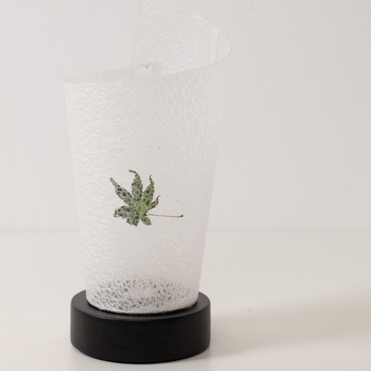 Japanese Paper Table Lamp "Maki" Momiji Leaf, white, Mino Washi paper and wood - angled view of unlit paper lamp from Japan.