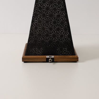 Japanese Paper Table Lamp "Mini Akari", black, wood - close-up of wooden base and toggle switch for the cordless lamp.