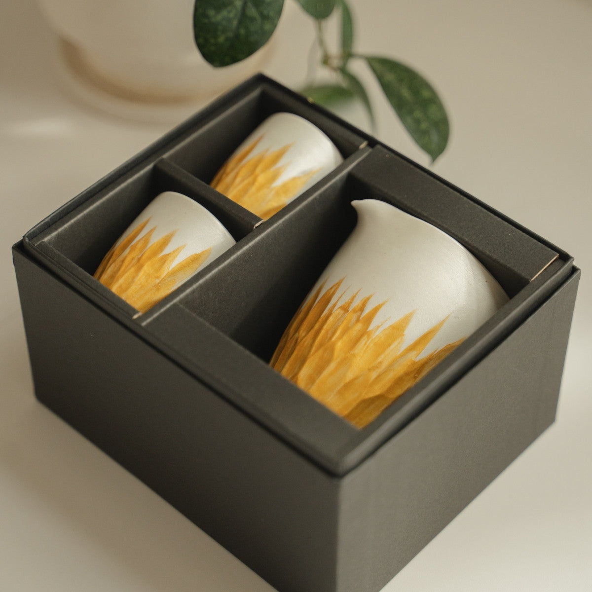White and gold arita porcelain sake set from Japan in a gift box, ready for sake lovers to gift on special occasions.