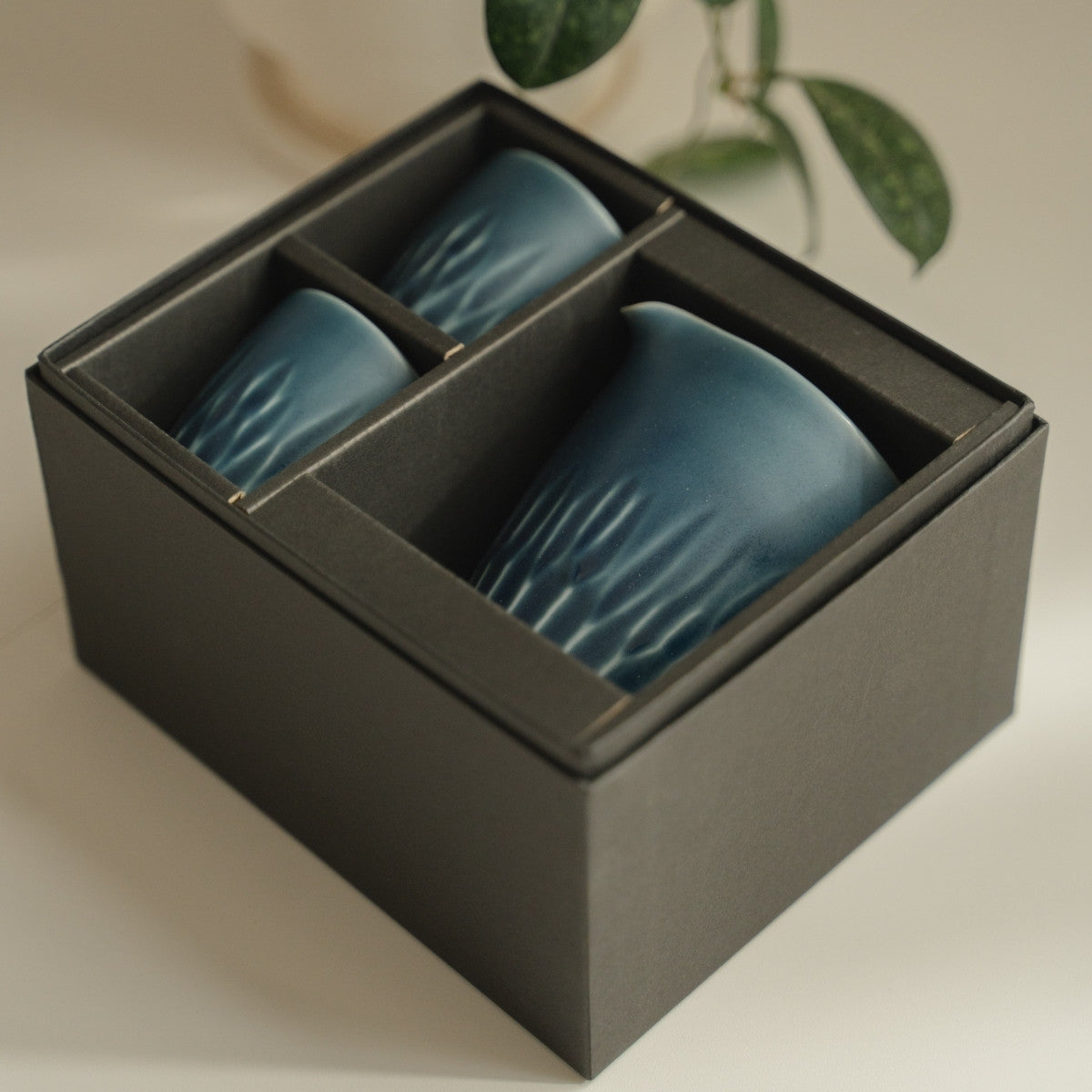 Matte lapis blue arita porcelain sake set from Japan in a gift box, ready for sake lovers to present as a premium gift.