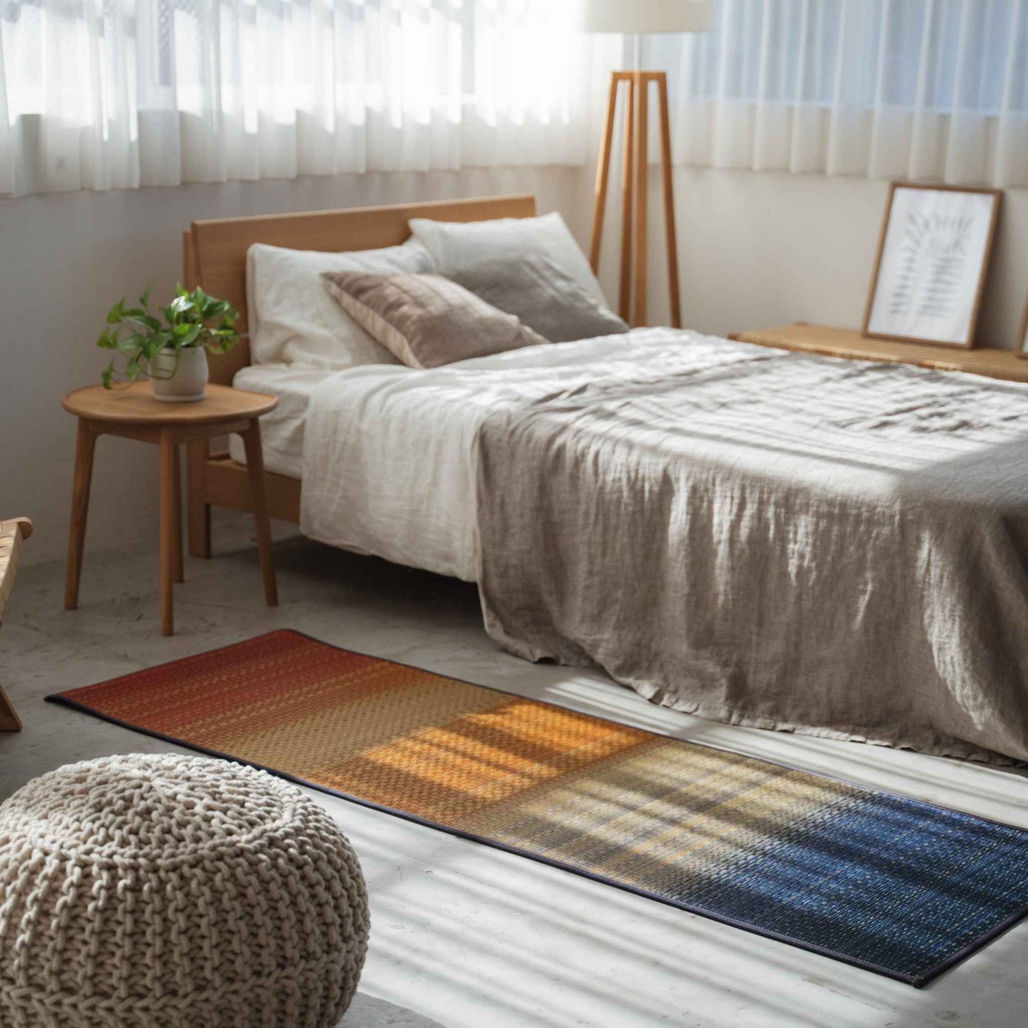 Red tatami mat placed on a bedroom floor serving as an energizing sanctuary for morning meditation.