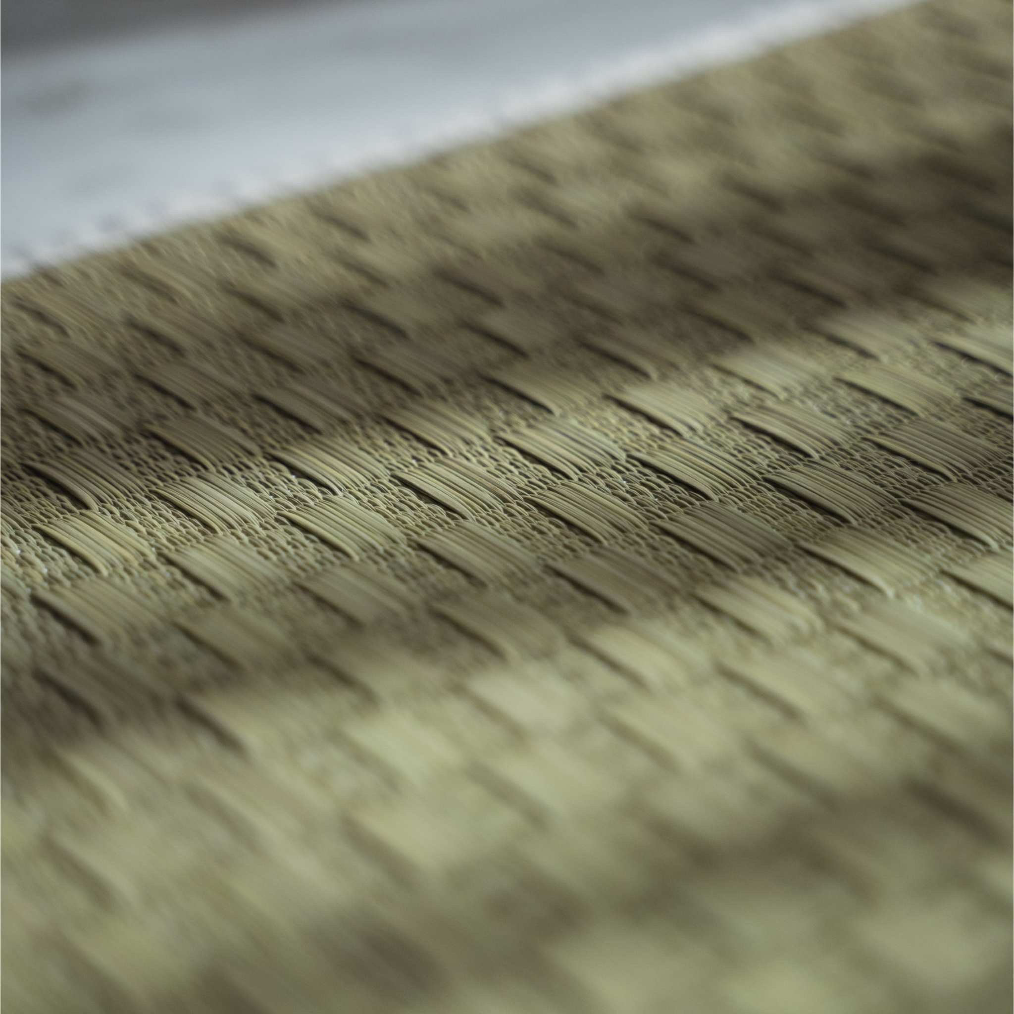 Close up of the authentic rush grass weave on a tatami yoga mat showing its breathable natural texture