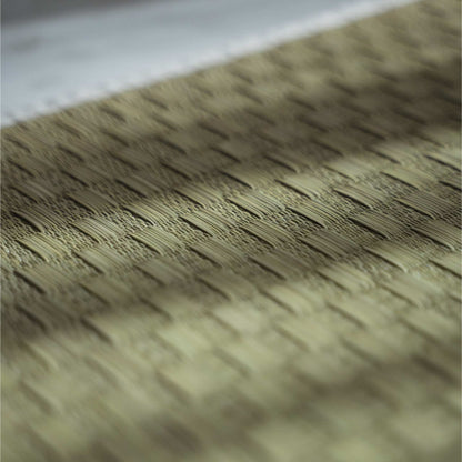 Close up of the authentic rush grass weave on a tatami yoga mat showing its breathable natural texture