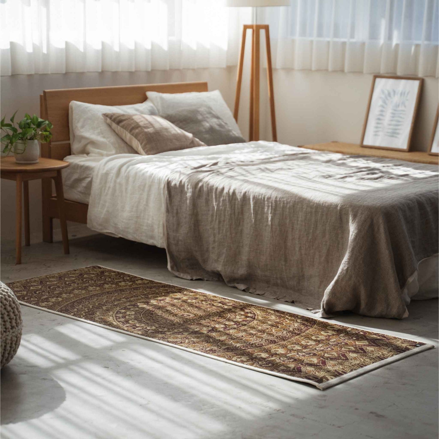 Brown tatami yoga mattress placed on a bedroom floor creating a spiritual sanctuary and Japanese decor accent.