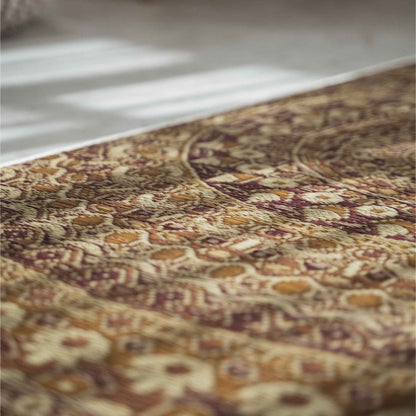 Close up of the intricate brown mandala design woven into a rush grass tatami mat for meditation focus.