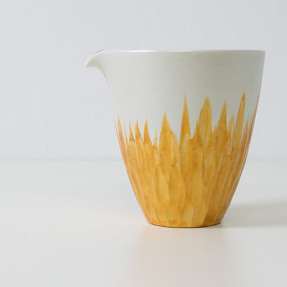 Gold floral sake carafe, white porcelain - Close up of a Japanese sake carafe with gold floral details