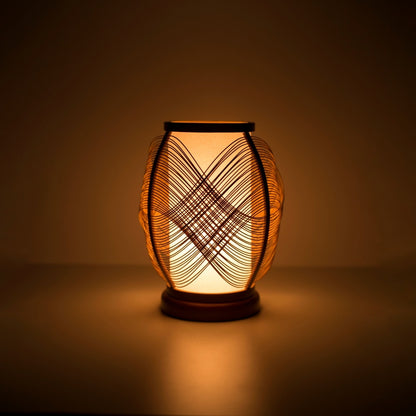 Japanese Bamboo Table Lamp "Koyou" illuminating a dark room - Elegant night stand lamp for cozy Japanese bedroom