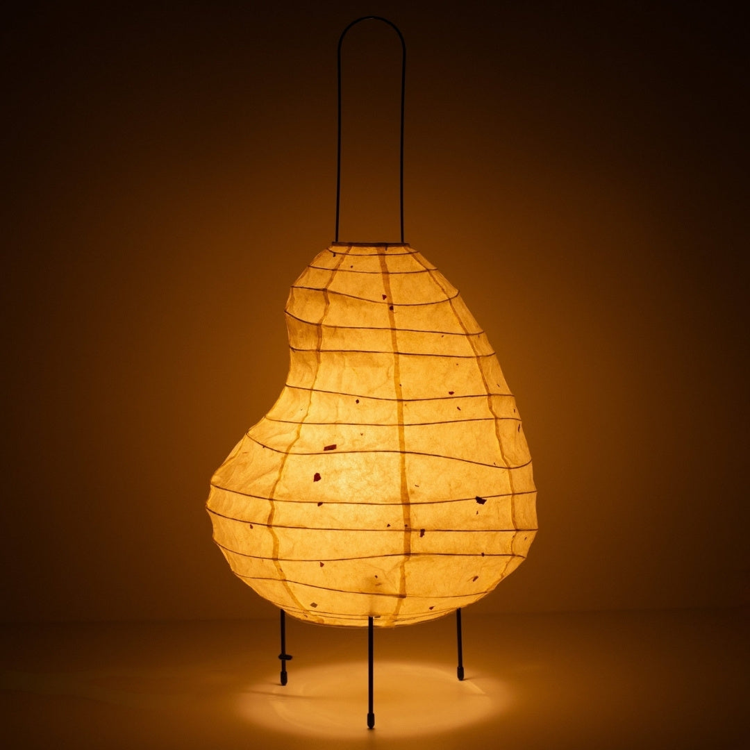 Unique bean-shaped paper floor lamp crafted with Japanese lantern techniques and 1300-year-old Mino washi paper.