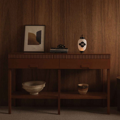 Japanese paper lantern flower diamond standing on a wooden console table in a mid century modern living room