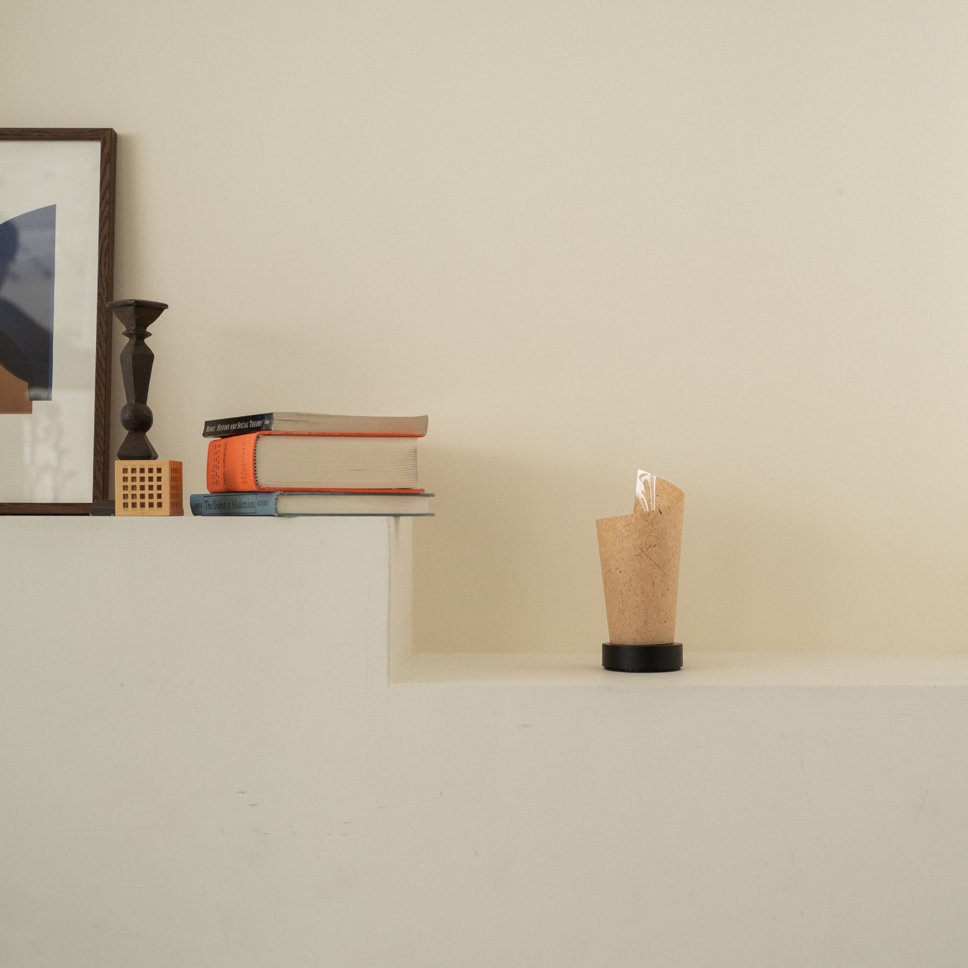Unlit Japanese paper table lamp "Maki" Cedar Bark with rustic flecks on a white console table in a Japandi living room.