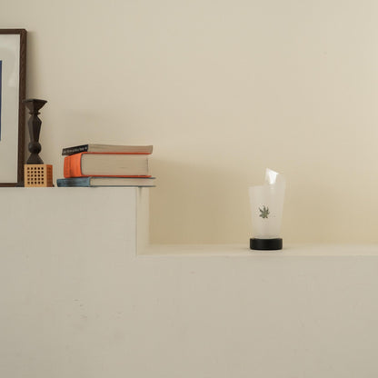 Unlit Japanese paper table lamp "Maki" Momiji Leaf with rustic flecks on a white console table in a Japandi living room.